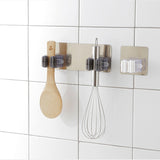 2/4pcs Adhesive wall mounted multi-purpose hooks.  Strong enough to hang brooms and mops.  Great for organizing kitchen utensils.