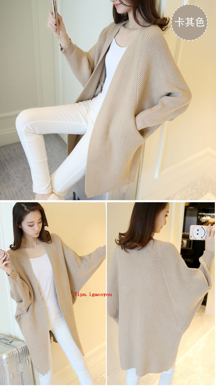 Ladies Long  Knitted, bat sleeve Sweater.