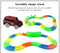 Flexible Glowing Race Track Set.  Amount Of Pieces And Number Of Cars Vary.