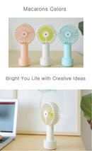 USB Rechargeable Handheld Mini cooling fan with water spray mist.