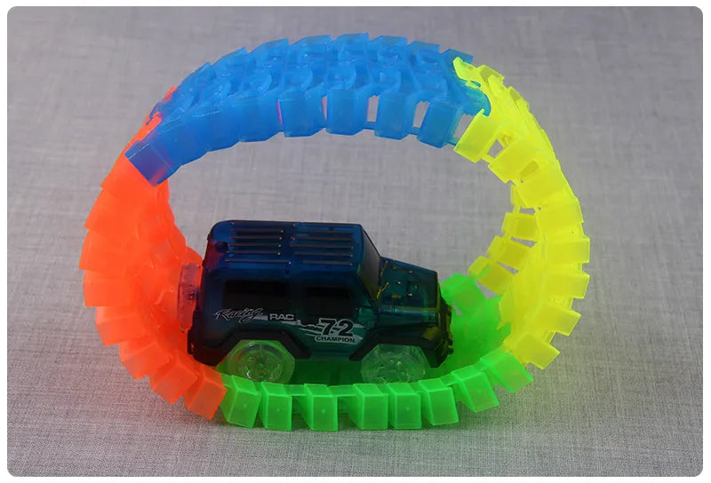 Flexible Glowing Race Track Set.  Amount Of Pieces And Number Of Cars Vary.