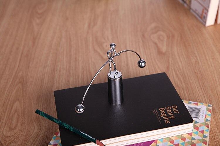 Newtons Cradle Steel Balance Ball for your desk or Children's Educational toy.