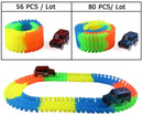 Flexible Glowing Race Track Set.  Amount Of Pieces And Number Of Cars Vary.