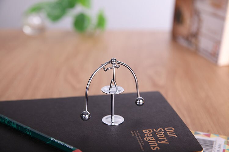 Newtons Cradle Steel Balance Ball for your desk or Children's Educational toy.