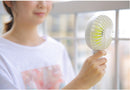 USB Rechargeable Handheld Mini cooling fan with water spray mist.