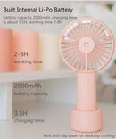 USB Rechargeable Handheld Mini cooling fan with water spray mist.