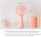 USB Rechargeable Handheld Mini cooling fan with water spray mist.