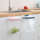 Kitchen Garbage Bag Rack that hangs on the front or back of the cupboard door.  Great for quick access