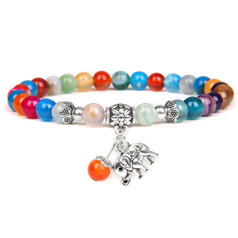 Ladies blue amazonite beaded bracelet with a metal elephant charm.
