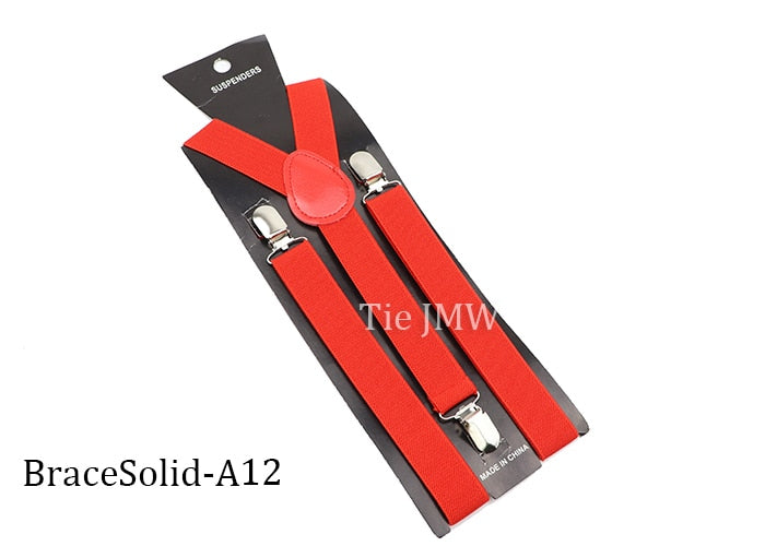 Leather Suspenders With Elastic Adjustable Straps.  Comes in a variety of solid Colors.