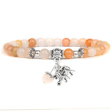 Ladies blue amazonite beaded bracelet with a metal elephant charm.