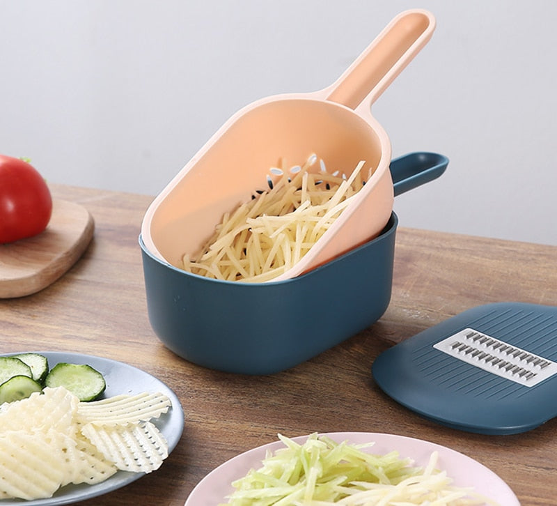 Multi-function Mandoline for Potato, Carrot, Cucumber. This fruit/vegetable tool lets you slice, cut, grate and can be used as a strainer.