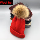 Wool/acrylic, fox fur pompom winter hats.