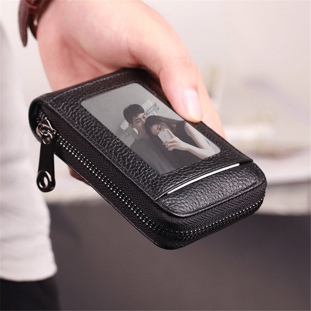 RFID unisex genuine leather business card holder or bank card holder. Secured closer with a zipper.