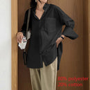 Celmia Women's Loose Fitting Long Sleeve Blouse With a Slit at the Back.