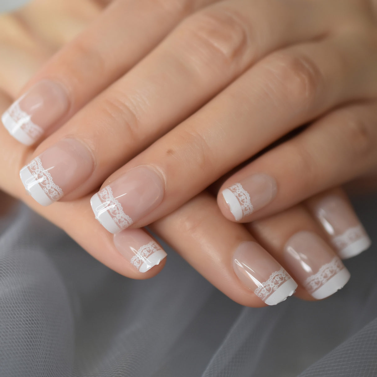 Adhesive Artificial Fingernails.