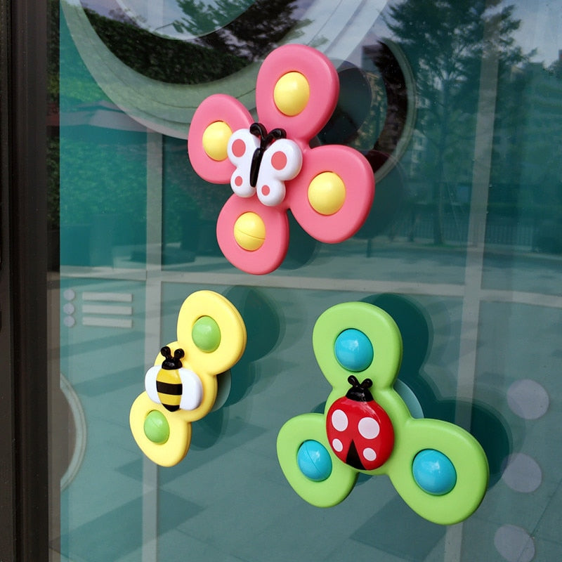 1pcs Cartoon Fidget Spinner.  Educational toy as well as rattle toy.