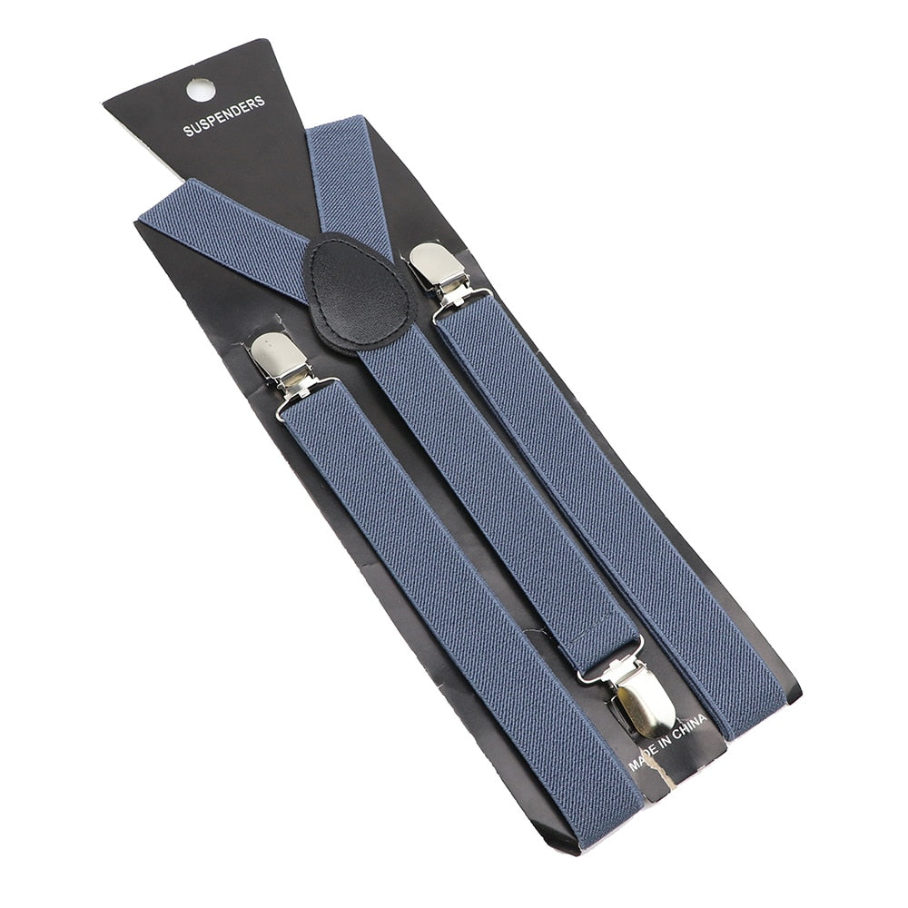 Leather Suspenders With Elastic Adjustable Straps.  Comes in a variety of solid Colors.
