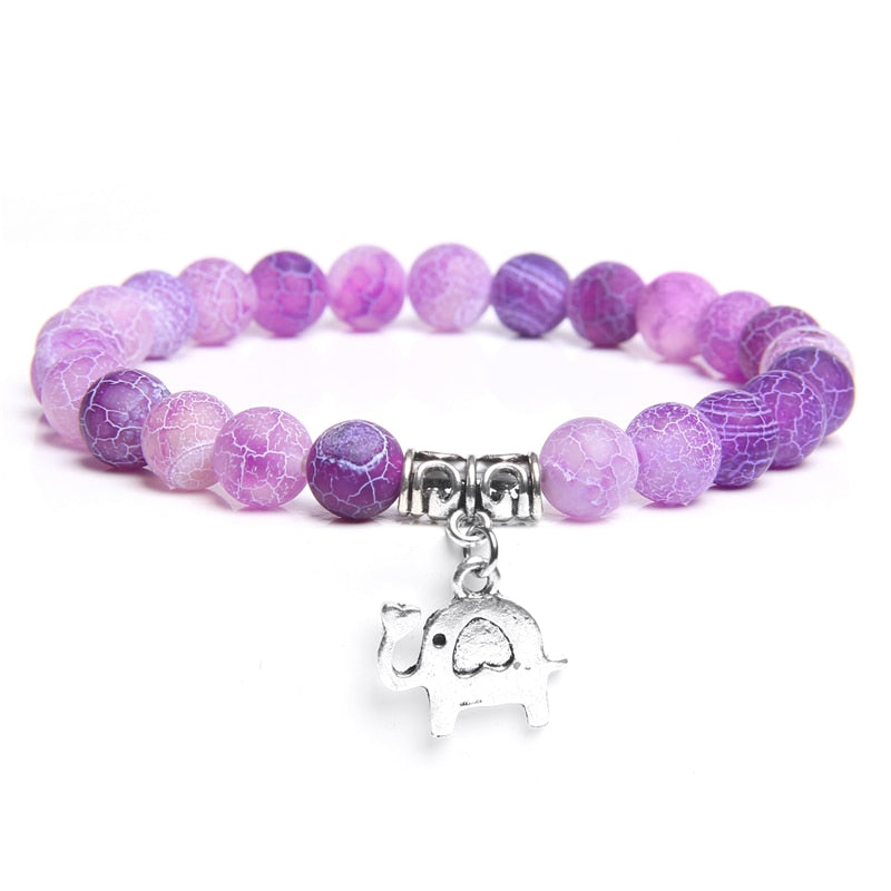 Ladies blue amazonite beaded bracelet with a metal elephant charm.