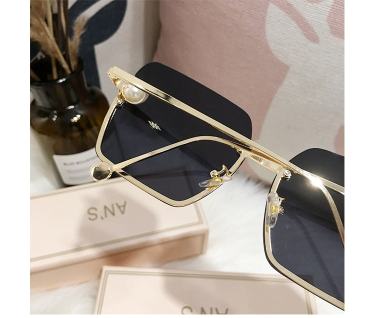 Ladies Rimless Sunglasses UV400 pearl.