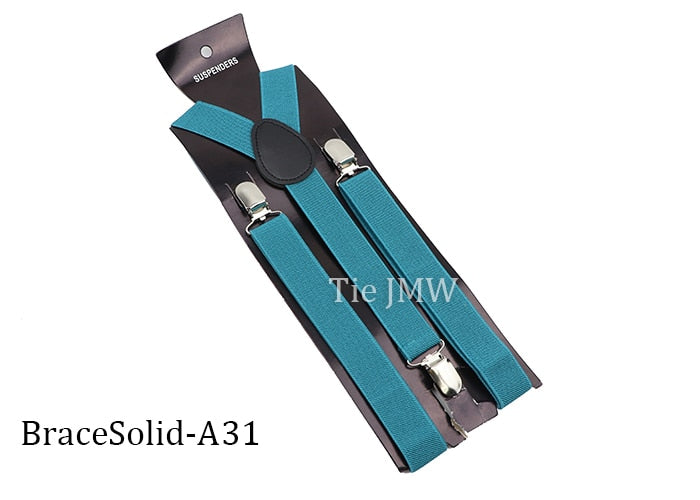 Leather Suspenders With Elastic Adjustable Straps.  Comes in a variety of solid Colors.