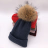 Wool/acrylic, fox fur pompom winter hats.