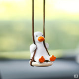 Car Rearview Mirror Ornaments Of Swinging Ducks.