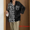 Celmia Women's Loose Fitting Long Sleeve Blouse With a Slit at the Back.