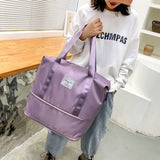 Women's AOTTLA casual handbag/carry on luggage bag for traveling.  Double zipper on bottom to expand bag..