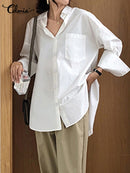 Celmia Women's Loose Fitting Long Sleeve Blouse With a Slit at the Back.