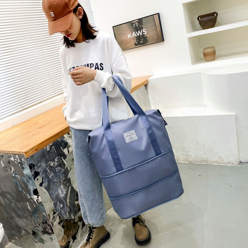 Women's AOTTLA casual handbag/carry on luggage bag for traveling.  Double zipper on bottom to expand bag..