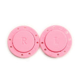 Invisible Magnet Buttons that can be sewed on to clothing.