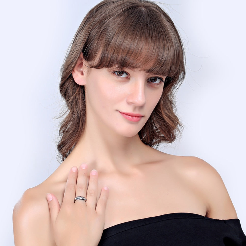 Woman's Exquisite Stainless Steel wedding Ring. Comes in Black, Gold or Silver.