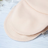 Perspiration Pads that attach over your shoulder.  Absorbing, Washable Shields to protect your best dress.