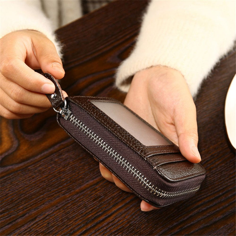 RFID unisex genuine leather business card holder or bank card holder. Secured closer with a zipper.