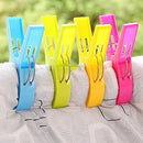 4Pcs Plastic Beach Towel Clips Or Laundry Pegs.