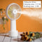 USB Rechargeable Handheld Mini cooling fan with water spray mist.