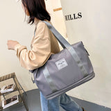 Women's AOTTLA casual handbag/carry on luggage bag for traveling.  Double zipper on bottom to expand bag..