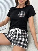 Women's Pajamas Set With Tee Shirt And Elastic Drawstring Shorts.