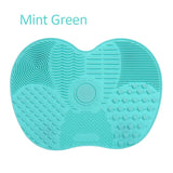 Silicone Pad with Suction Cups For Cleaning Makeup Brushes.