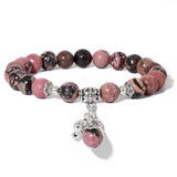 Ladies blue amazonite beaded bracelet with a metal elephant charm.