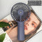 USB Rechargeable Handheld Mini cooling fan with water spray mist.