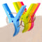 4Pcs Plastic Beach Towel Clips Or Laundry Pegs.