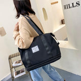 Women's AOTTLA casual handbag/carry on luggage bag for traveling.  Double zipper on bottom to expand bag..