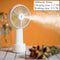 USB Rechargeable Handheld Mini cooling fan with water spray mist.