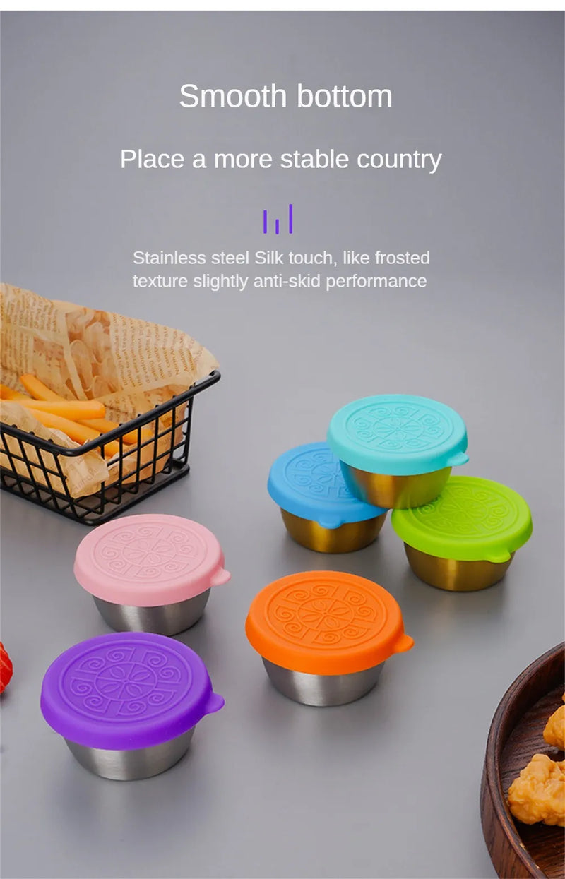 Leak Proof Condiment Containers with Lids OR Squeezable Sauce Bottles.