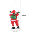 Christmas Decoration Of Santa Claus Climbing on A Rope Ladder.