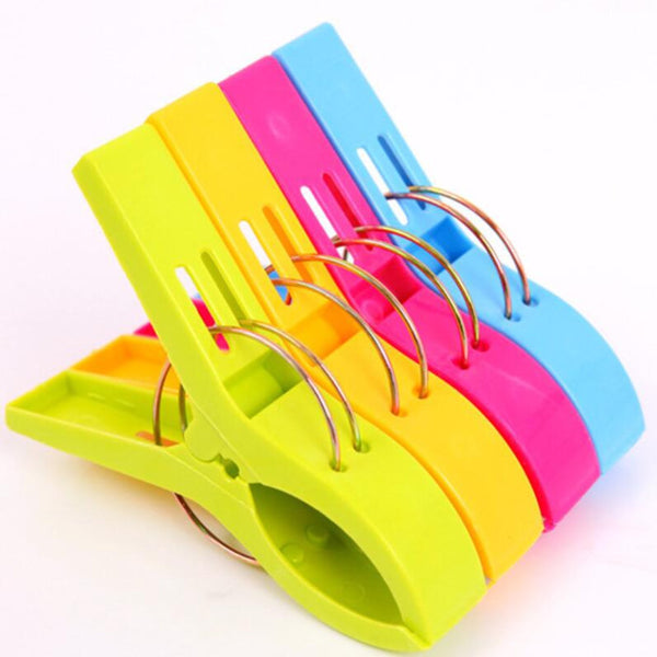 4Pcs Plastic Beach Towel Clips Or Laundry Pegs.