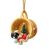 Hanging Christmas Tree Decorations Of Cute Dog sleeping in Cup.