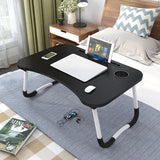 Portable Laptop table with folding legs.